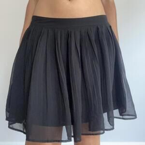 Black mini skirt with mesh overlay, elastic waistband